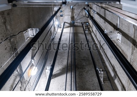 Elevator Shaft featuring Cables and Bright Lights for Enhanced Functionality and Aesthetics