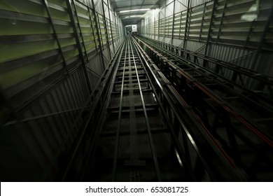 Elevator slots moving upward