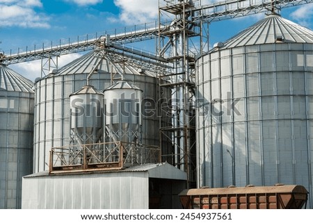 Elevator for wheat, corn, soy storage and grain. Import grains, wheat, corn, soy. Loading and transportation of agricultural products by railway. Agribusiness.