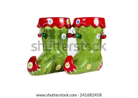 Elf boot candles against a white background