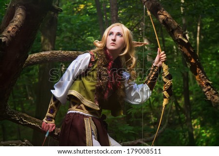 Elf holding a bow with an arrow