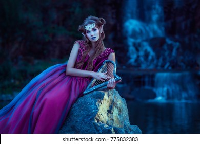 Elf woman in violet dress