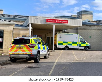 Elgin, Scotland - 20th Apr 2021: Police car  Ambulance parked infant Dr Grays hospital in Elgin, Scotland