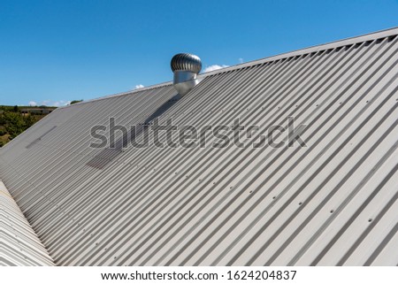 Elgin, Western Cape, South Africa. December 2019. An overview of a new new roof with an extractor fan 