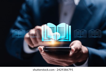 E-library concept. Electronic books online, knowledge base on internet, digital library or e-library. Businessman use smartphone with Ebook icon on virtual screen. - Powered by Shutterstock