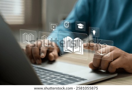 E-library and E-learning Concept, Person using laptop with virtual E-Book icons for online knowledge Base, Digital library, Access electronic books on Internet. Course education. Webinar technology.