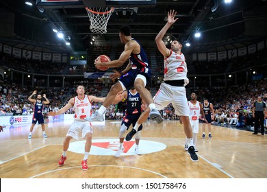 Elie Okobo and Rudy Gobert of France and Nikola Vucevic and Sead Sehovic of Montenegro during Friendly Game Basketball match between France vs Montenegro 8,15,2019 Astroballe Lyon France