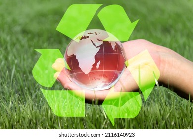 Eliminate Waste And Pollution. Circular Economy Concept. Hand With Globe