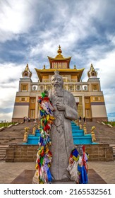 ELISTA, RUSSIA - APRIL 23, 2022: Photo of Sculpture Tsagaan Aav and Buddhist temple "Golden Abode of Buddha Shakyamuni"