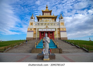 ELISTA, RUSSIA - SEPTEMBER 21, 2021: Sculpture of a White elder on the background of a Buddhist temple "Golden Abode of Buddha Shakyamuni". Kalmykia