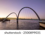 Elizabeth Quay Pedestrian Bridge in Perth at dusk