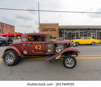 Elizabethtown, KY, USA - July 31, 2021: Classic Hotrod Driving During The Cruisin' The Heartland 2021 Car Show In Downtown Elizabethtown, KY.