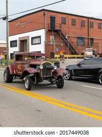 Elizabethtown, KY, USA - July 31, 2021: Classic Hotrod Driving During The Cruisin' The Heartland 2021 Car Show In Downtown Elizabethtown, KY.