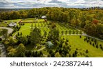 Elizabethtown, Pennsylvania, October 22, 2023 - An Aerial View of a Large Gazebo in the Middle of a Vineyard, With Seating for a Weddings on an Autumn