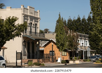 Elk Grove, California, USA - July 16, 2021: Afternoon sunlight shines on historic downtown Elk Grove.