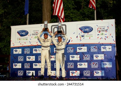Elkhart Lake Wisconsin, USA - August 18, 2012: Road America Road Race Showcase, ALMS, multi-class sports car and GT motor race. American Le Mans Series Four-hour, timed period. GTC Podium 1st 