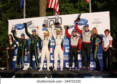 Elkhart Lake Wisconsin, USA - August 18, 2012: Road America Road Race Showcase, ALMS, multi-class sports car and GT motor race. American Le Mans Series Four-hour, timed period. GT podium 