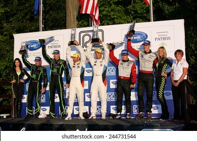 Elkhart Lake Wisconsin, USA - August 18, 2012: Road America Road Race Showcase, ALMS, multi-class sports car and GT motor race. American Le Mans Series Four-hour, timed period. GT winners