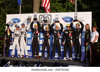 Elkhart Lake Wisconsin, USA - August 18, 2012: Road America Road Race Showcase, ALMS, multi-class sports car and GT motor race. American Le Mans Series Four-hour, timed period. P1 Podium 