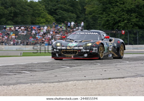 Elkhart Lake Wisconsin, USA - August 18, 2012: Road\
America Road Race Showcase, ALMS / IMSA sports car GT race.\
American Le Mans Series Four-hour, timed. Bill Sweedler, Townsend\
Bell, Lotus Evora 