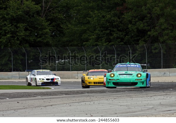 Elkhart Lake Wisconsin, USA - August 18, 2012: Road\
America Road Race Showcase, ALMS / IMSA sports car GT motor race.\
American Le Mans Series Four-hour, timed period. Wolf Henzler,\
Bryan Sellers 