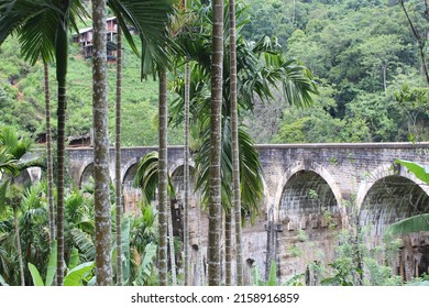 Ella, Sri Lanka – April 15, 2022: The Nine Arches Bridge behind the jungle, a famous tourist spot in Sri Lanka. 