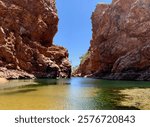 Ellery Creek Big Hole, a spectacular waterhole cutting through a gorge in the West MacDonnell Ranges