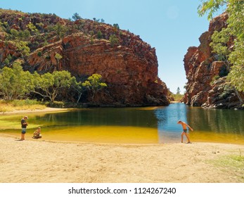 Ellery Creek Big Hole, West Mac Donnell Rangers National Park, 80km West Of Alice Springs,  Central Australia. September 2017. Father With 2 Sons At A Swimming Hole And Gorge. 