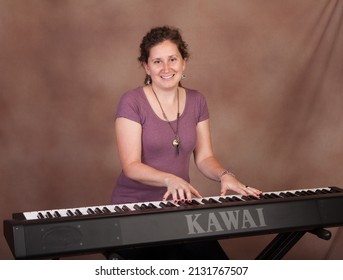 Ellington, CT, USA - Jan 23, 2011 -  2013-2015 Connecticut State Troubadour, Kristen Graves At The Piano