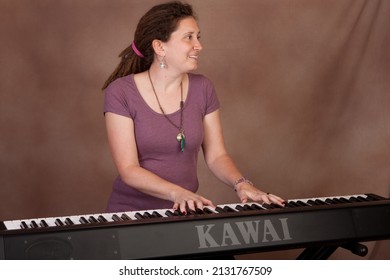 Ellington, CT, USA - Jan 23, 2011 -  2013-2015 Connecticut State Troubadour, Kristen Graves At The Piano