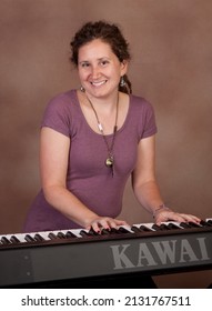 Ellington, CT, USA - Jan 23, 2011 -  2013-2015 Connecticut State Troubadour, Kristen Graves At The Piano