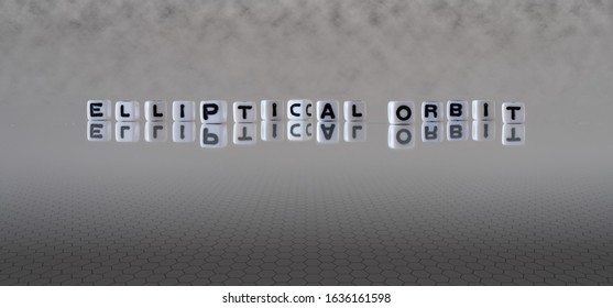 Elliptical Orbit Concept Represented By Wooden Letter Tiles