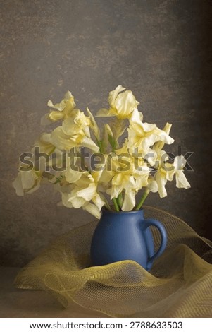 ellow iris flowers in vase