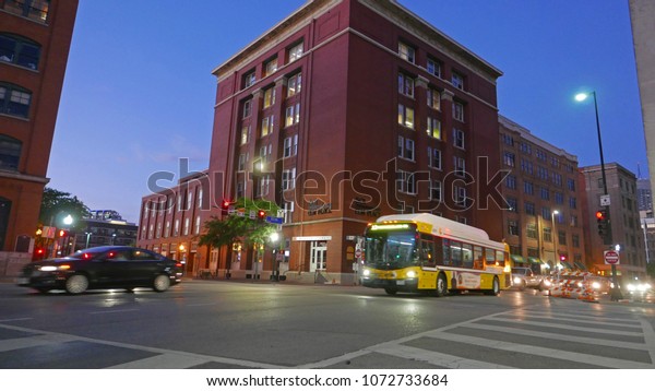 ELM STREET DOWNTOWN DALLAS,\
TEXAS USA, 4-17-2018: The street corner at the Book depository in\
Downtown Dallas is a lively spot and tourist attraction. April\
17th, 2018