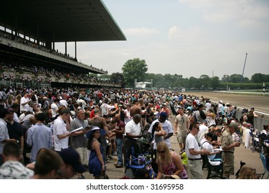 ELMONT - JUNE 6: Part Of The Crowd Of 52,000 At Belmont Park On Belmont Stakes Day - June 6, 2009 In Elmont, NY.