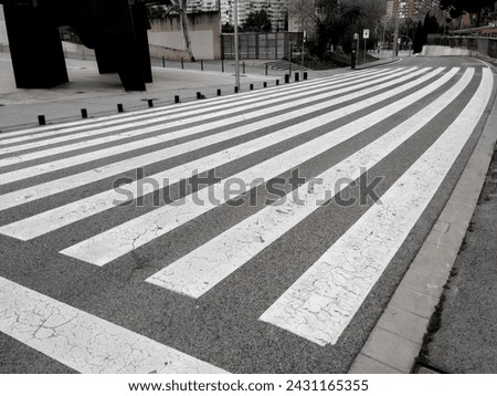 Similar – Road crossing with wide crosswalk in the USA