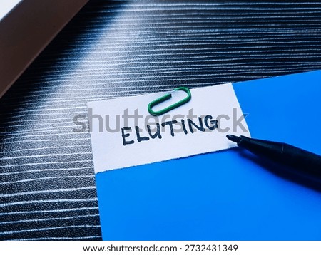Eluting writting on table background. 