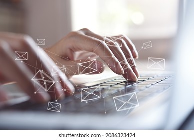 Email concept. Close up of business woman typing on computer keyboard with email icons, internet network on virtual screen, E-mail campaign, direct marketing - Shutterstock ID 2086323424