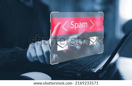 Email concept with laptop spam and virus computer monitor internet security concept, businessman reading electronic mail with a laptop. Spam, junk and e-marketing on screen, Spam Email Pop-up Warning.
