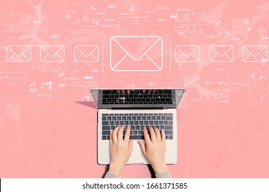 Email concept with person using a laptop computer