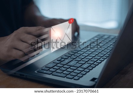 Email marketing concept, Business person sending email by a laptop computer to customer, business contact and communication, email icon, sending e-mail or newsletter, online working internet network.