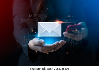 Email Marketing Concept. Businessman Hand Holding Envelope Or Email Icon Global Digital Business Network. Electronic Mail, E-commerce. Newsletter Email, Sending Data, Access To Information