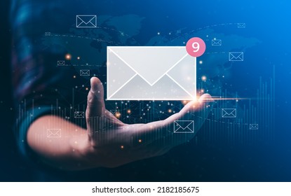 Email Marketing Concept. Businessman Hand Holding Envelope Or Email Icon Global Digital Business Network. Electronic Mail, E-commerce. Newsletter Email, Sending Data, Access To Information