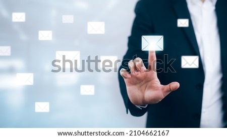 e-mail and marketing concept. Double exposure Businessman touch Email pressing for sending the e-mail from the laptop computer, Concept of sending emails from your computer,