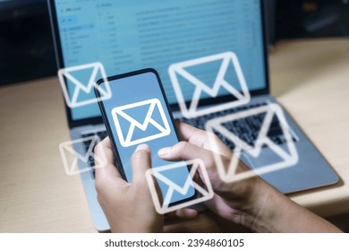 Email marketing concept. Hand of businessman using smartphone , tablet, for email virtual screen. Business digital technology and marketing.	
 - Powered by Shutterstock