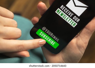 Email marketing and newsletter concept. Hand of woman press subscribe button to join the newsletter, register a new member concept