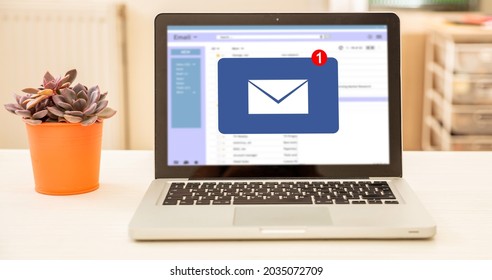 Email Message Inbox On Computer Laptop Screen On A White Office Desk, Blur Room Interior Background. 