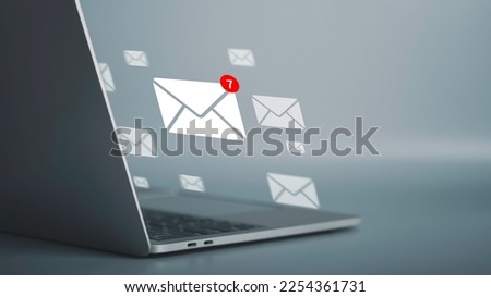Email notification alert, E-mail marketing concept Businessman using laptop with  mail message on virtual screen sending or reply online communication  social advertisement contact.