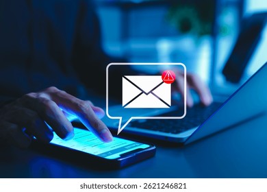 Email security warning notification concept. A person using a smartphone with email security alert icons and warning notifications, indicating cybersecurity threats, spam, virus, junk mail, and scams.