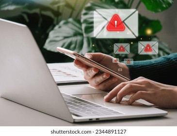 Email Spam concept. Business Woman hold smartphone , Business woman send E-mail virtual screen technology future wireless network connection over the world - Shutterstock ID 2344891127